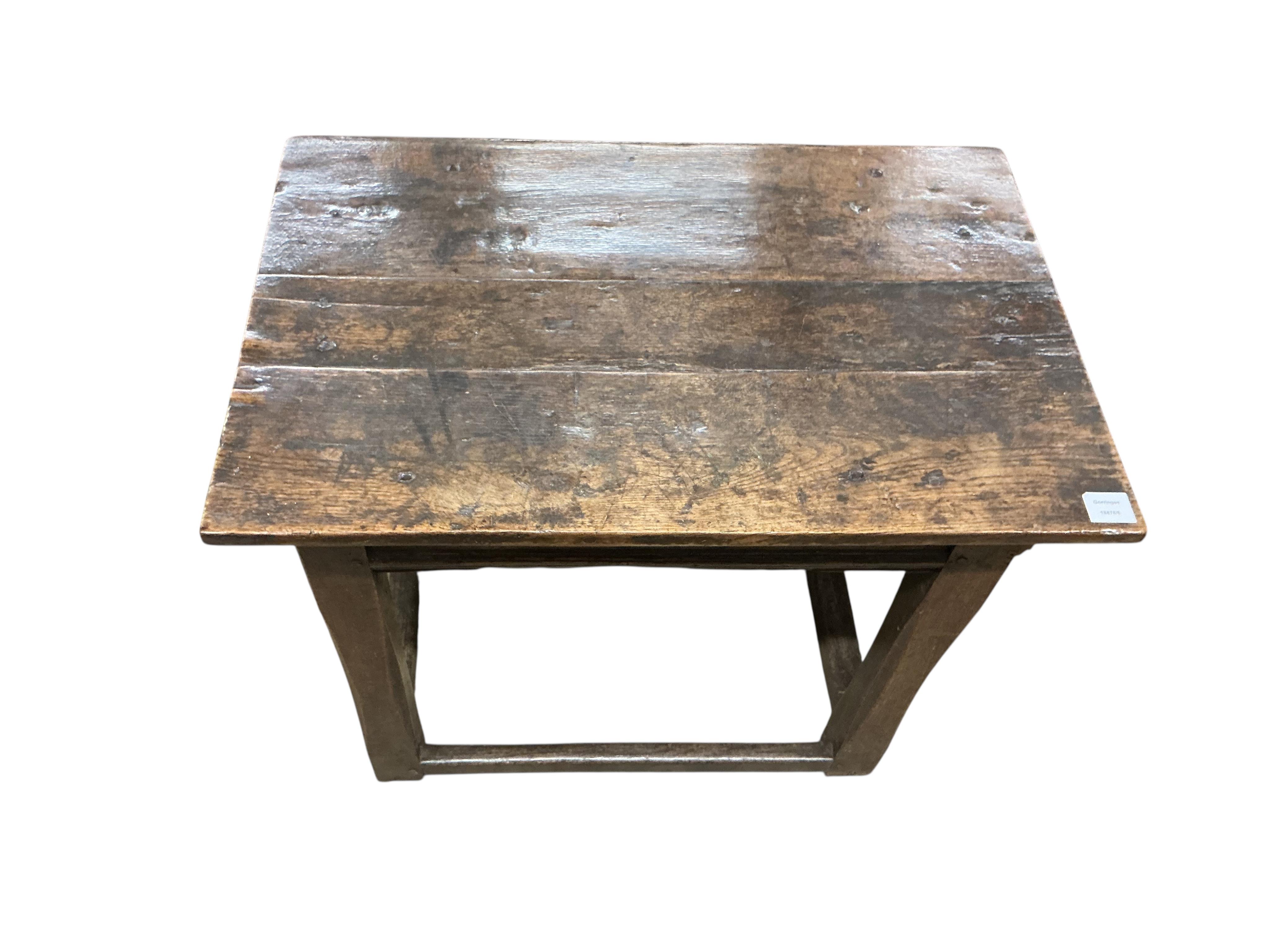 A small late 17th century oak side table, the rectangular top on square chamfered supports, width 80cm, depth 53cm, height 71cm